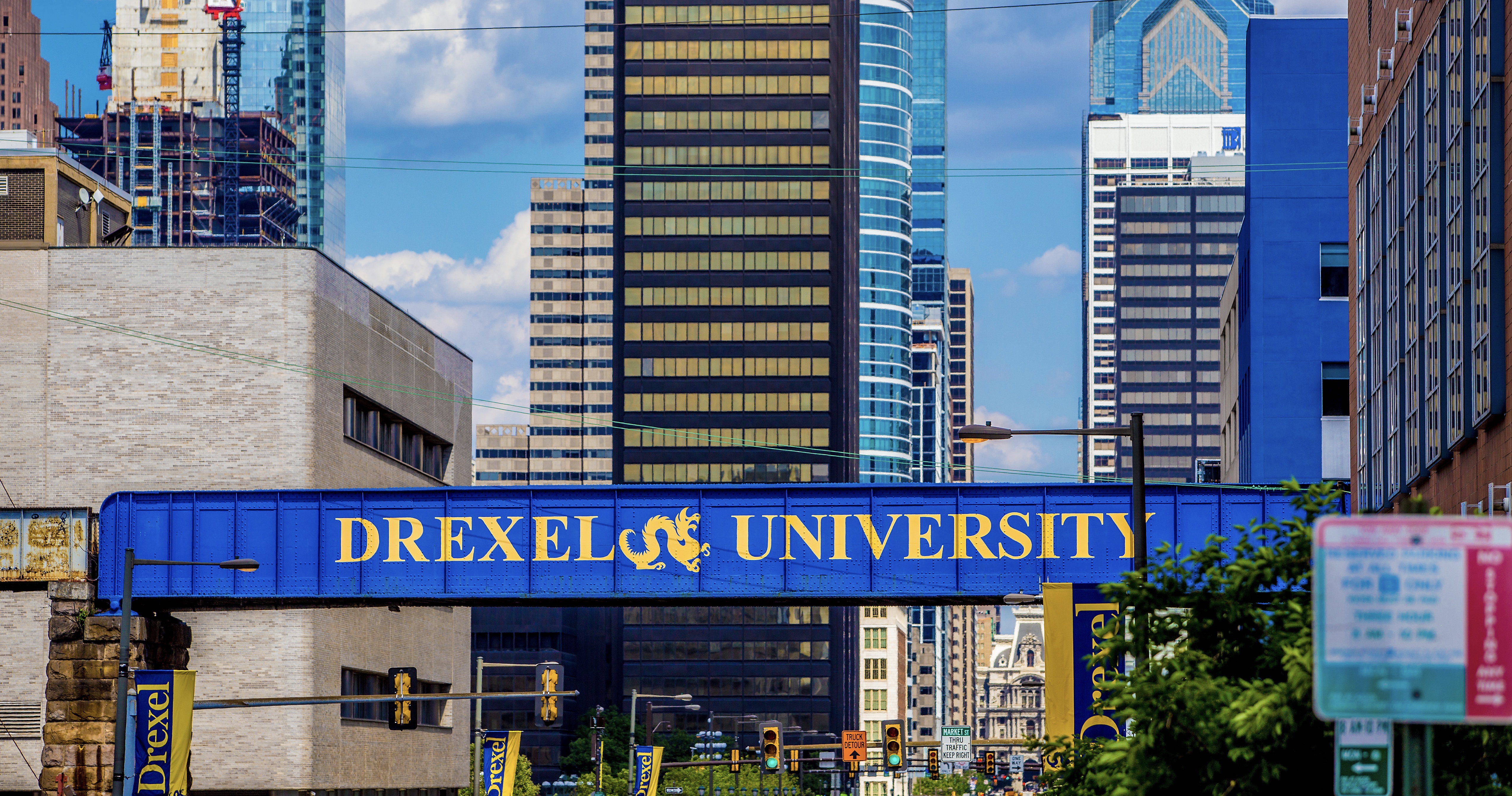 image of Drexel sign on rail bridge